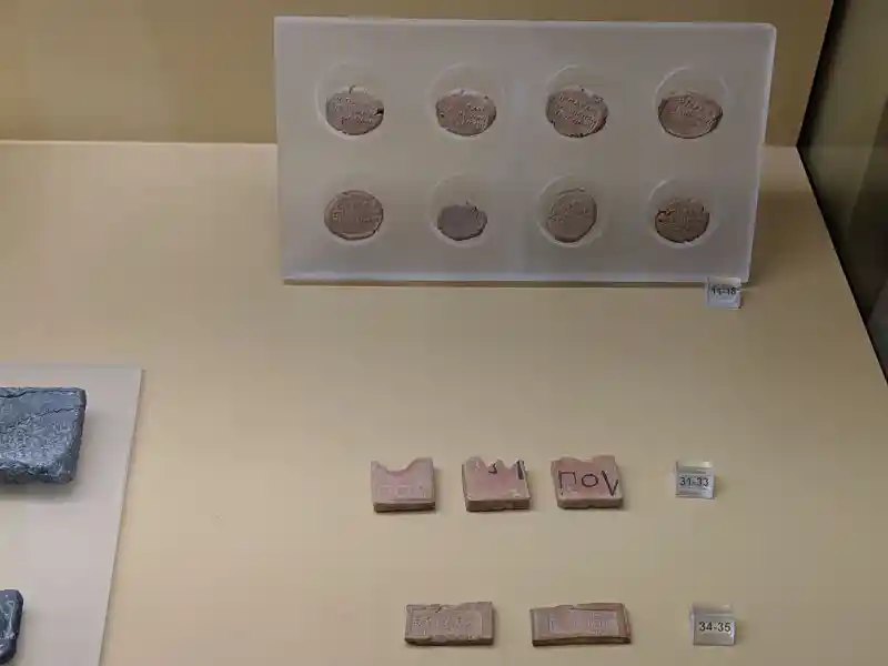 Oficial weights and mesures clay and lead tokens Classical and Hellenistic Greek periods